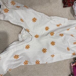 Little Earth Cream Jumpsuit with Orange Accents